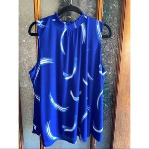 High neck, sleeveless blouse